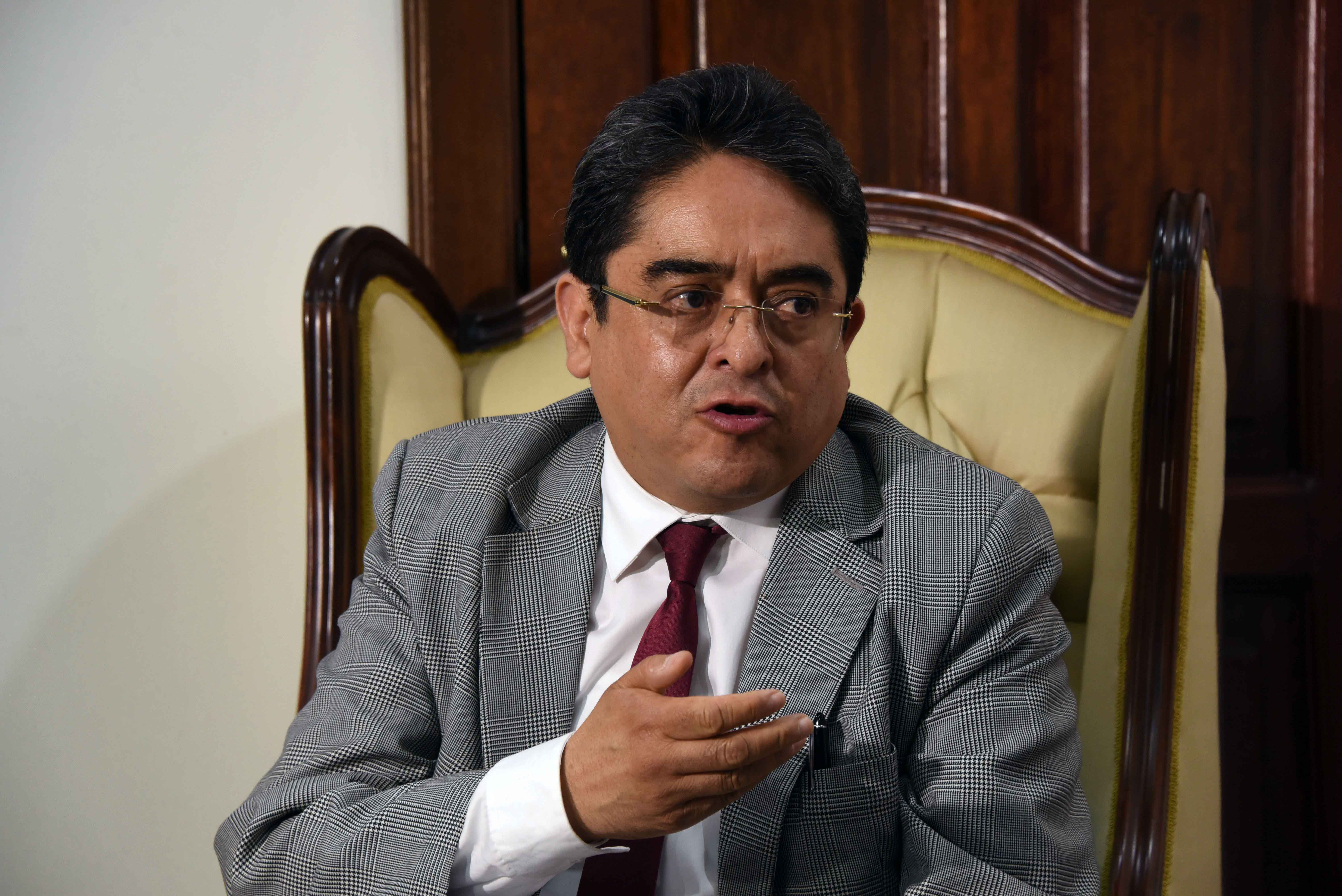Guatemala’s Human Rights Ombudsperson Jordan Rodas speaks during a press conference after a meeting with members of the organization "proud of my PNC" (Civil National Police), formed by relatives of police officers, in Guatemala City on July 17, 2018. 