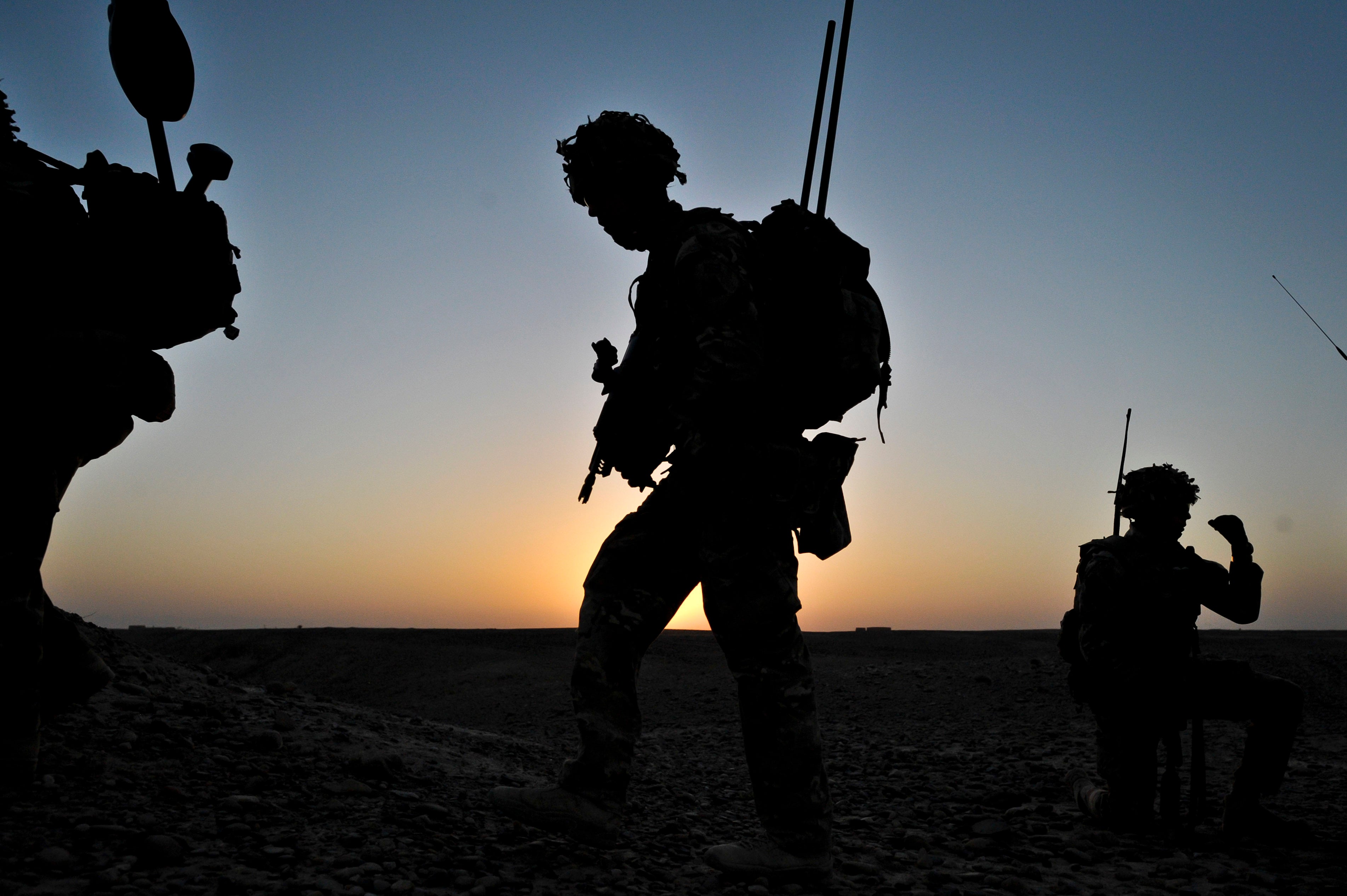 British troops conduct a dawn foot patrol in Helmand Province, Afghanistan, May 10, 2013.