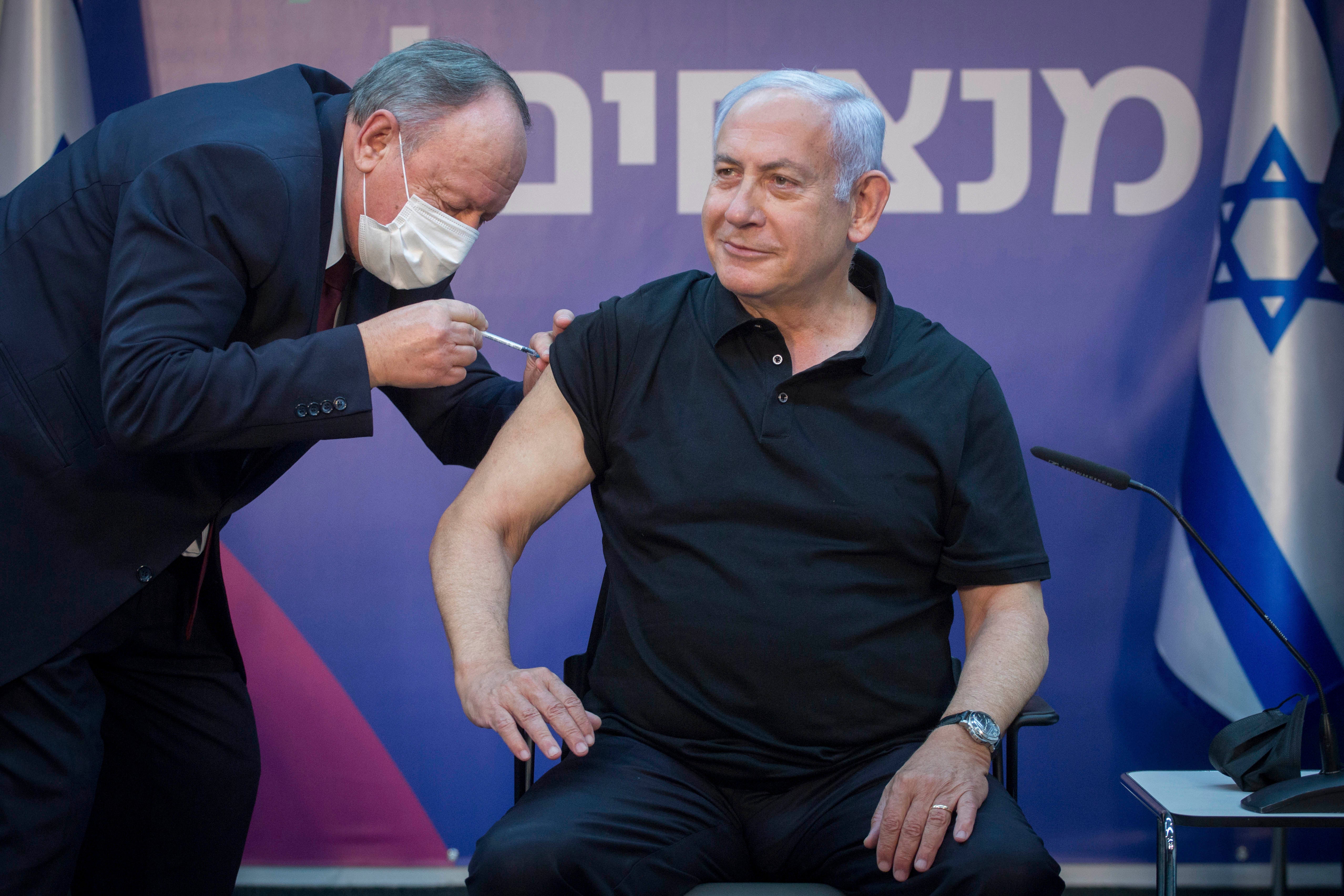 Israeli Prime Minister Benjamin Netanyahu receives the second dose of the Covid-19 vaccine in Ramat Gan, Israel on January 9, 2021.