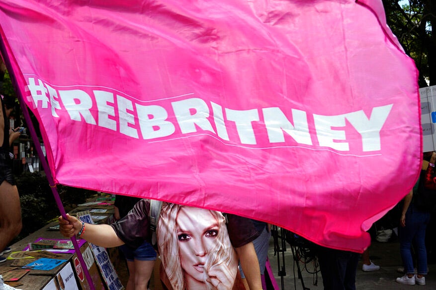 A "Free Britney" sign shows support for popstar Britney Spears who had a scheduled hearing in her conservatorship case at the County Courthouse in Los Angeles, June 23, 2021.