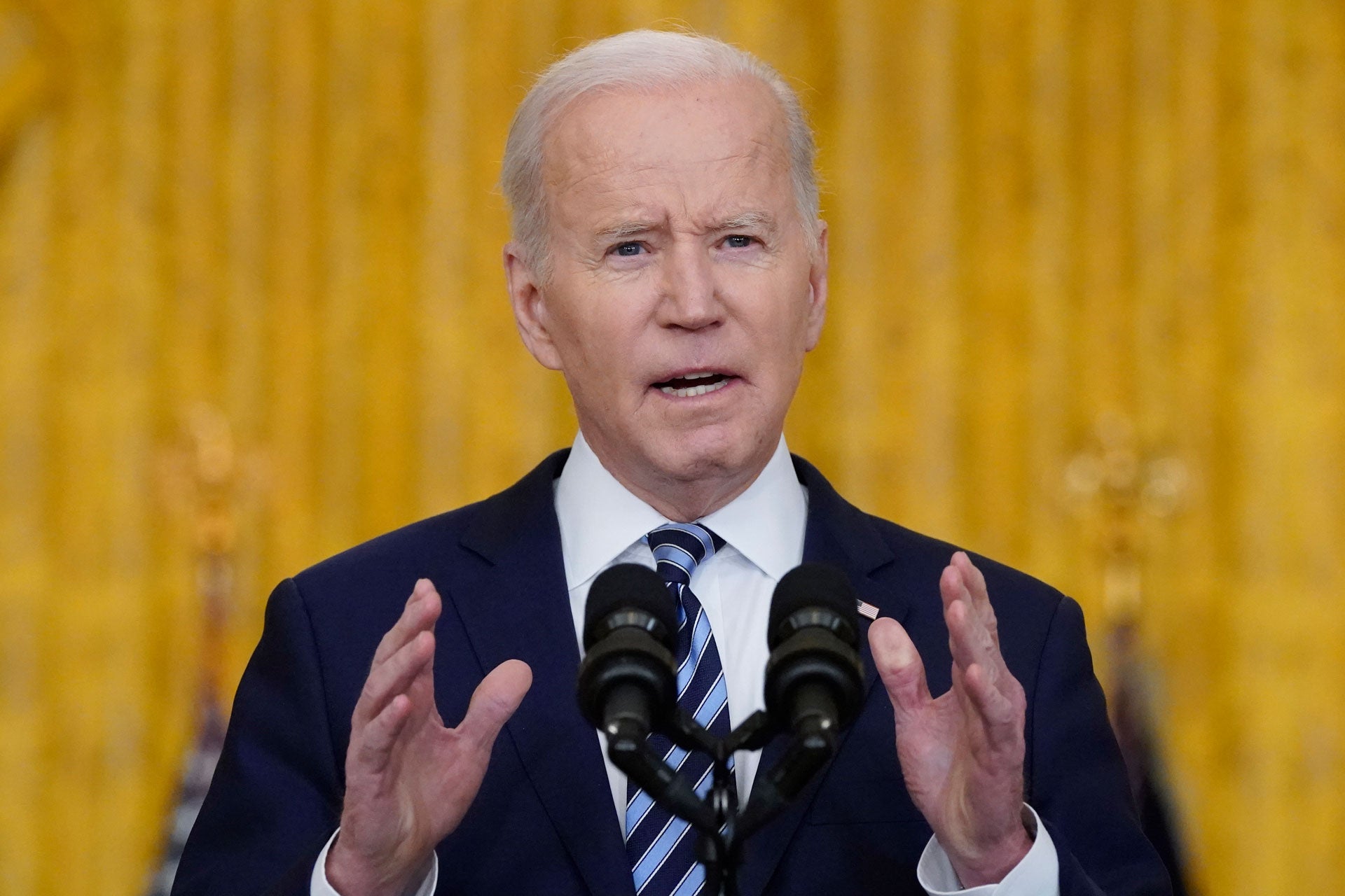 US President Joe Biden speaks in the East Room of the White House in Washington, February 24, 2022.