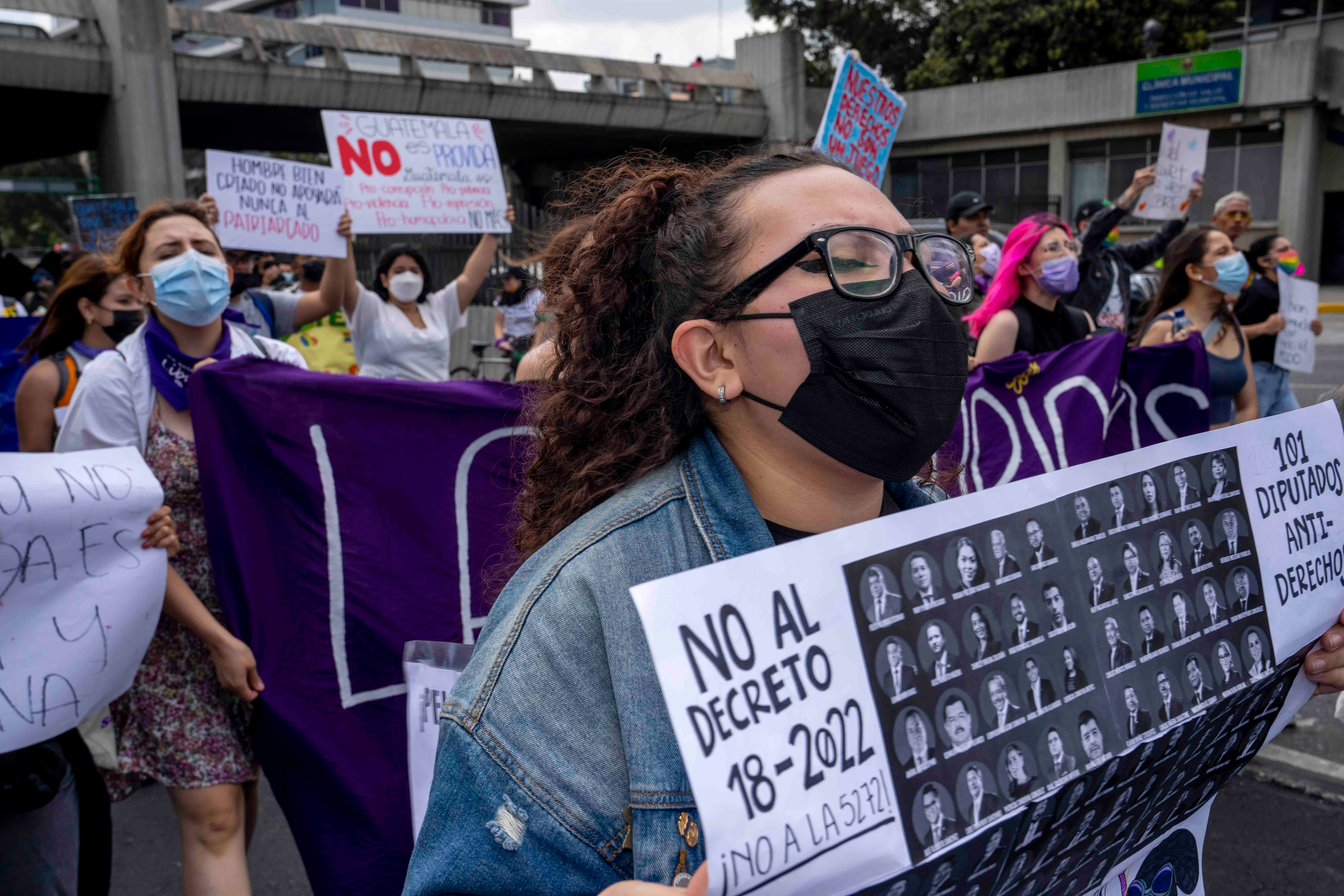 People protest a bill that would have increased sentences for women who terminate their pregnancies, prohibited same-sex marriage and banned discussion of sexual diversity in schools, in Guatemala City, Saturday, March 12, 2022