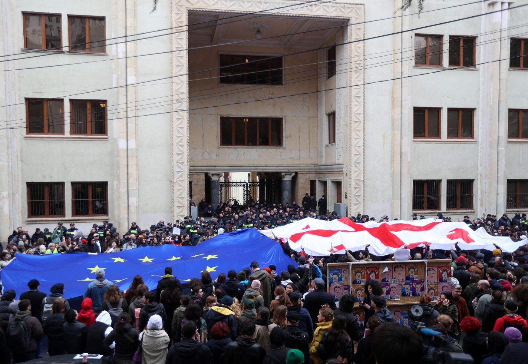 People take part in a protest against the controversial "foreign agents" bill outside the parliament building in Tbilisi, Georgia March 6, 2023.