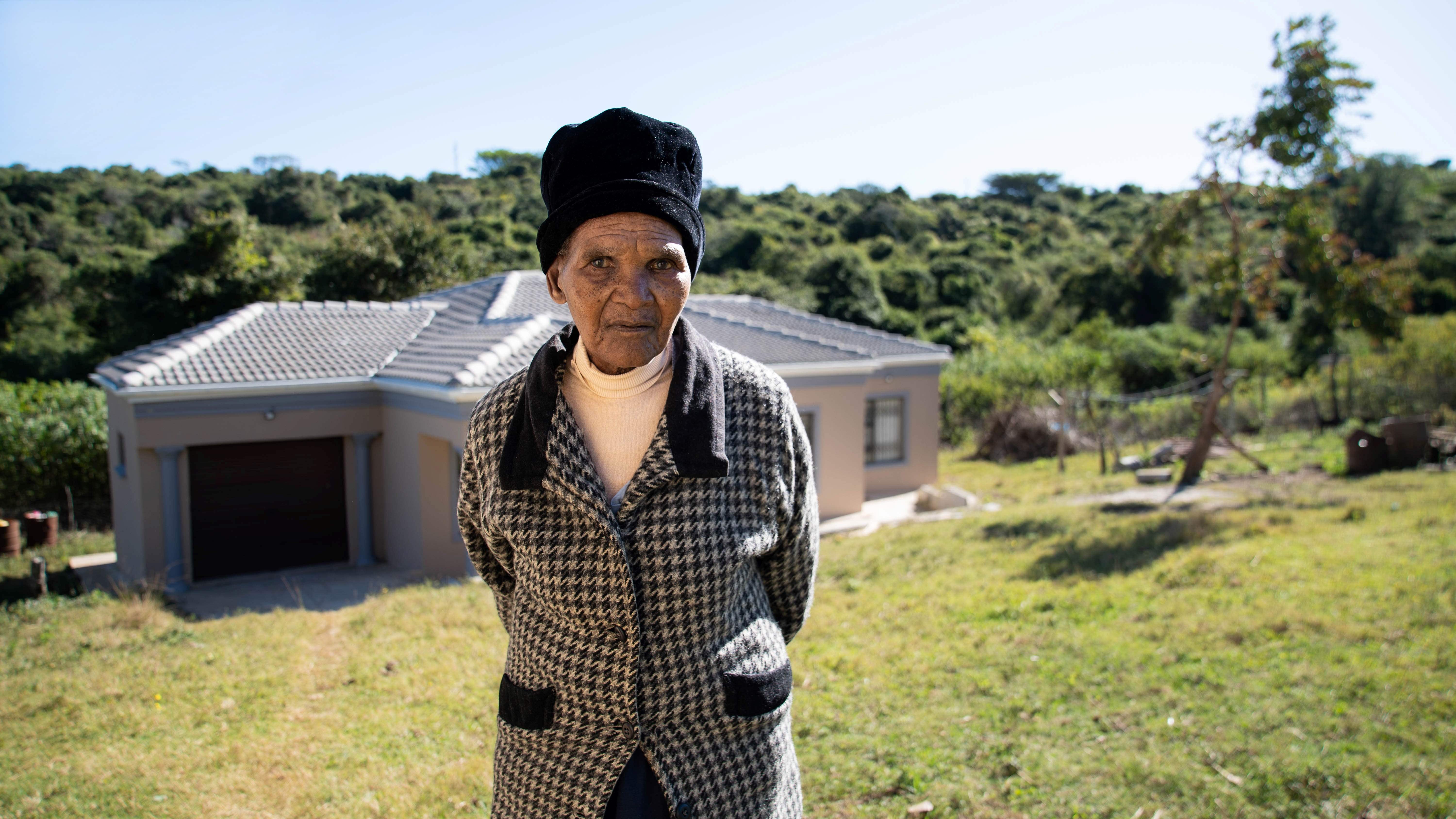 Nozala Ndoyana, 84, in front of her home 