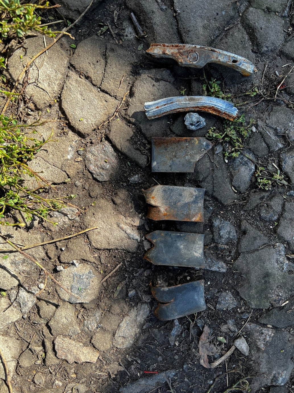 Remnants of 9N210 or 9N235 fragmentation submunitions that a family collected from their garden on the left bank of the Siverskiy Donets River while Russian forces occupied the area in 2022.  