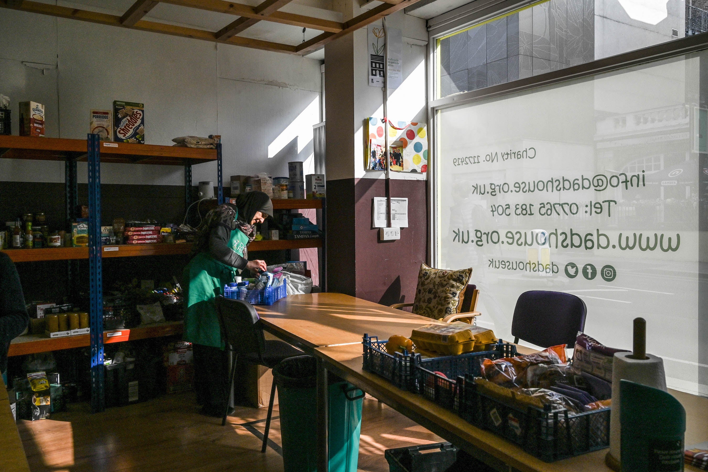 Food and household products are laid out to be given to those in need at the Dads House charity in the West Brompton district of London, UK, October 13, 2022. 