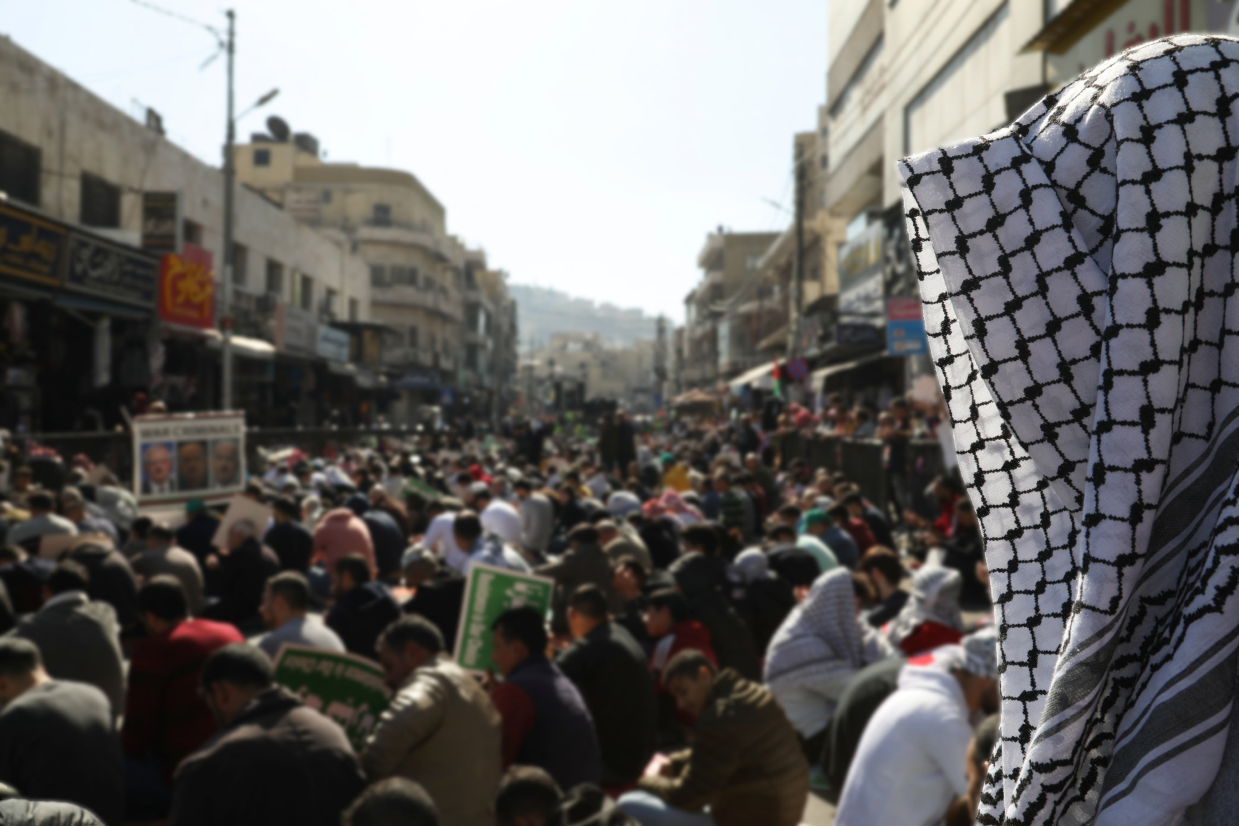 People attend a protest in support of Palestinians in Gaza in Amman, Jordan, November 24, 2023.
