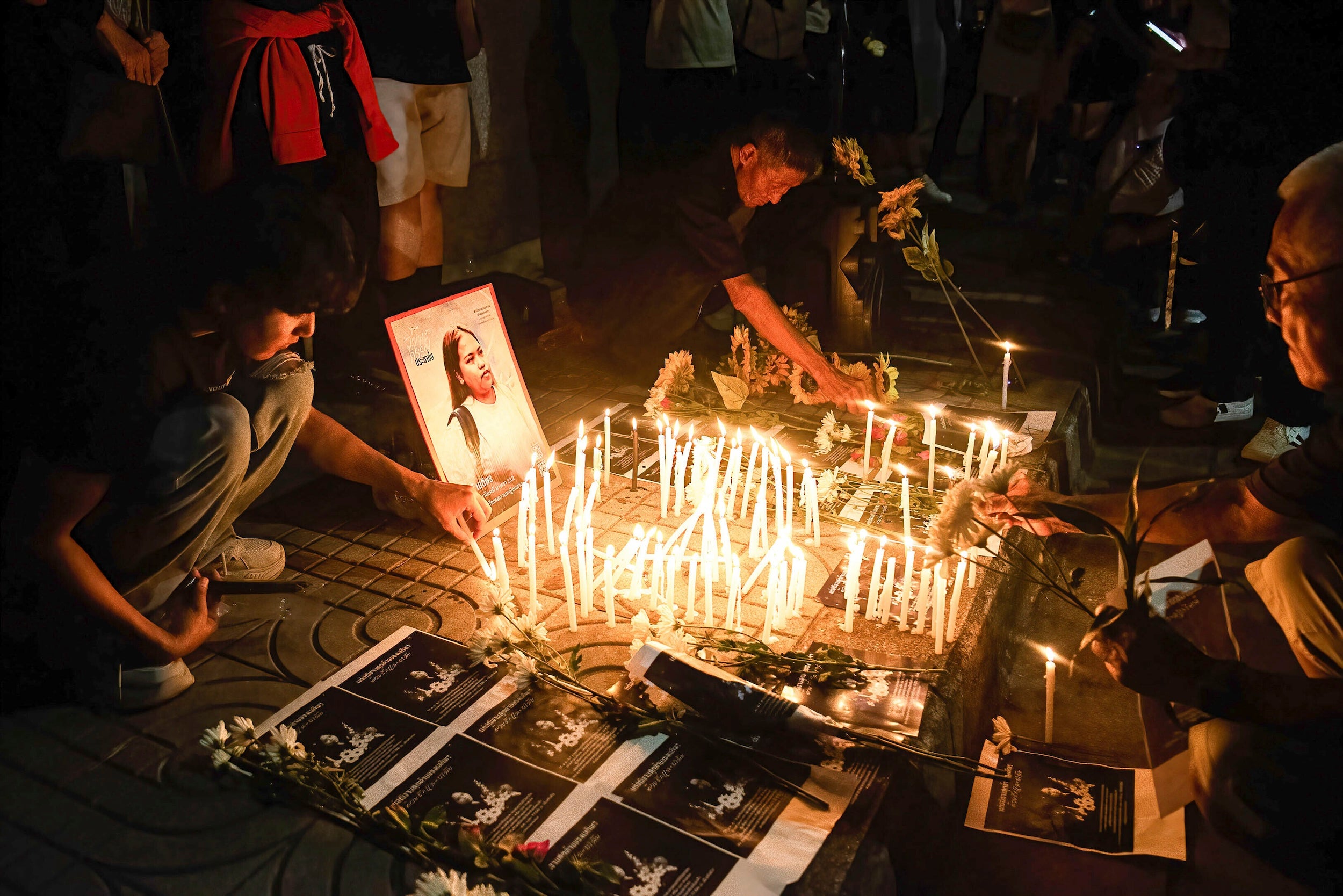 Pro-democracy protesters during a mourning ceremony for Netiporn “Bung” Sanesangkhom, a Thai political activist, outside the Southern Bangkok Criminal Court on May 14, 2024.