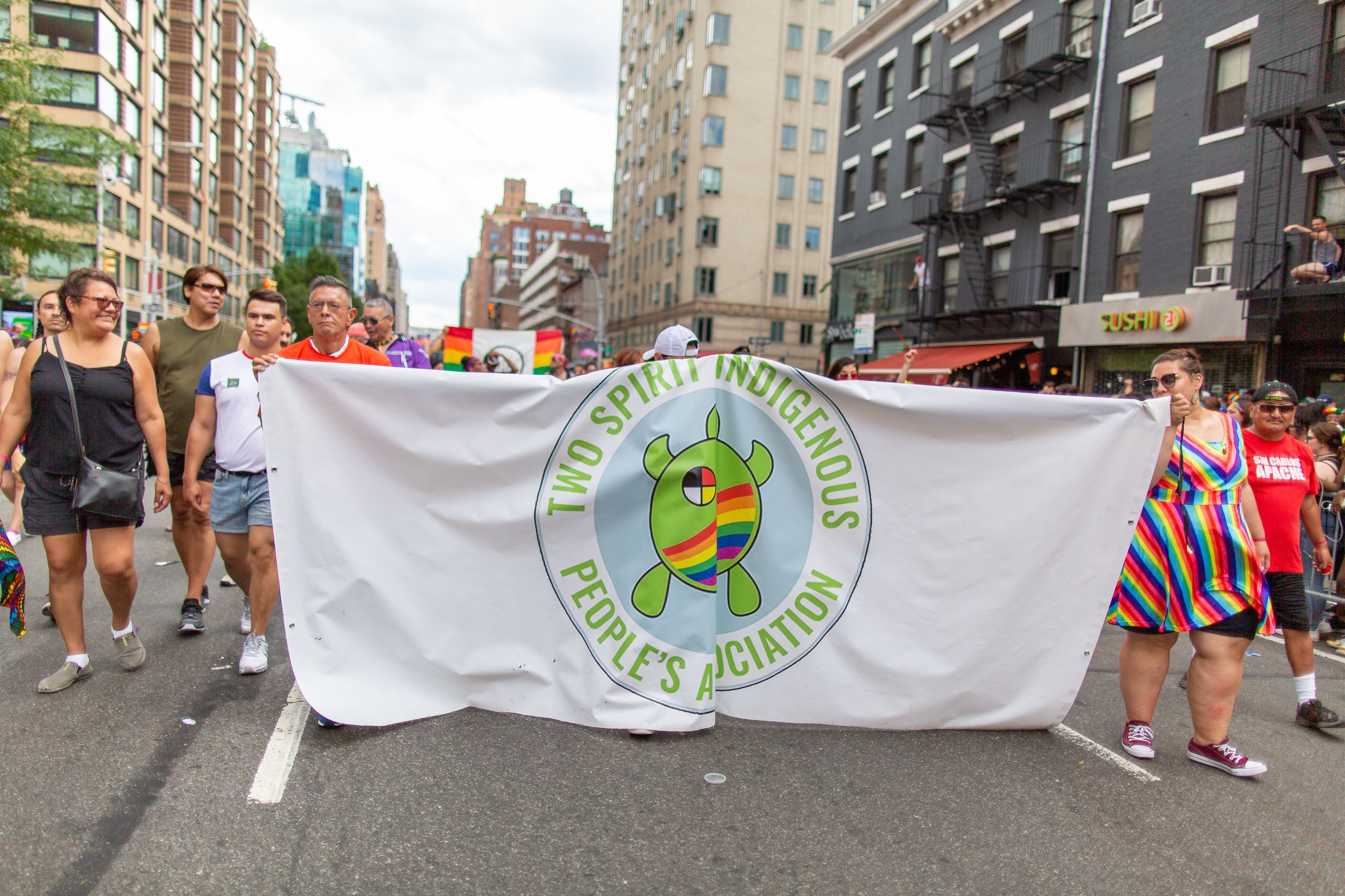 NYC Pride March: WorldPride 2019 | Stonewall 50, 5th Avenue, NYC, Manhattan, New York, United States - 30 Jun 2019. Members of the Two Spirit Indigenous Peoples Association march during World Pride in New York City, June 30, 2019. 
