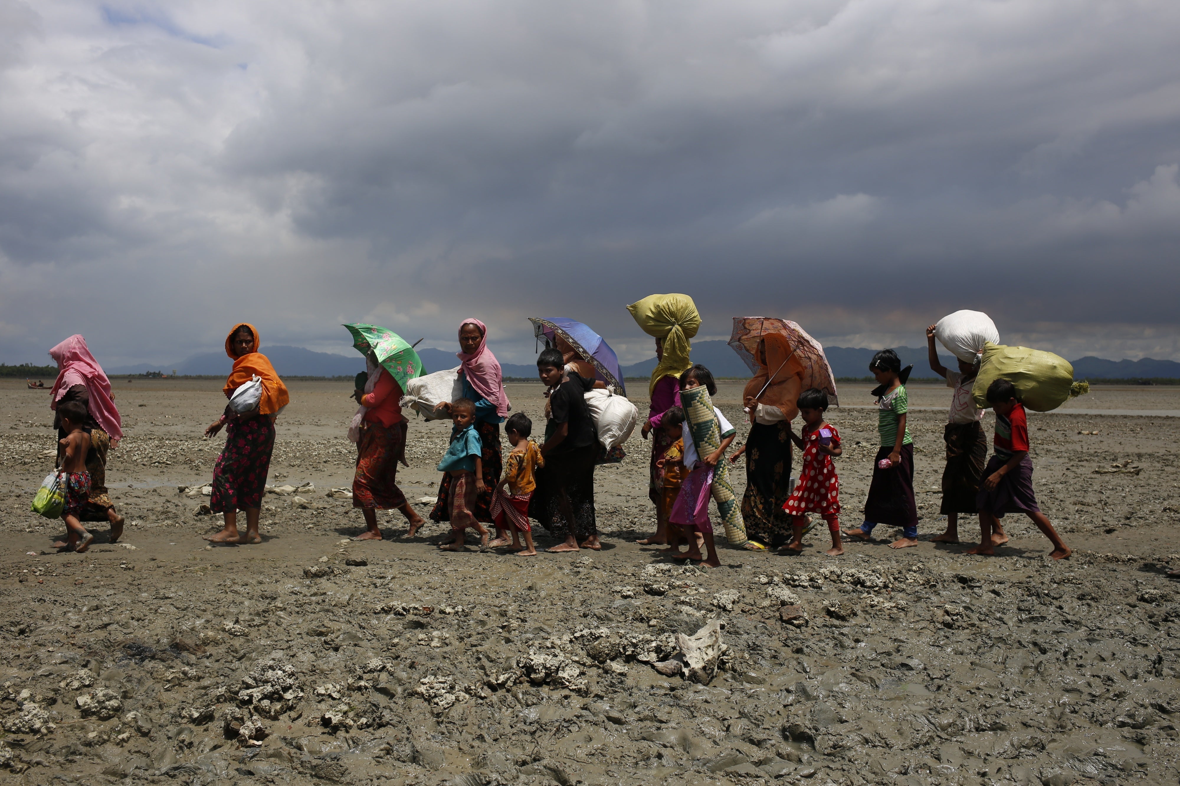 Rohingya refugees heading toward a camp at Teknaf, Bangladesh, September 13, 2017. 