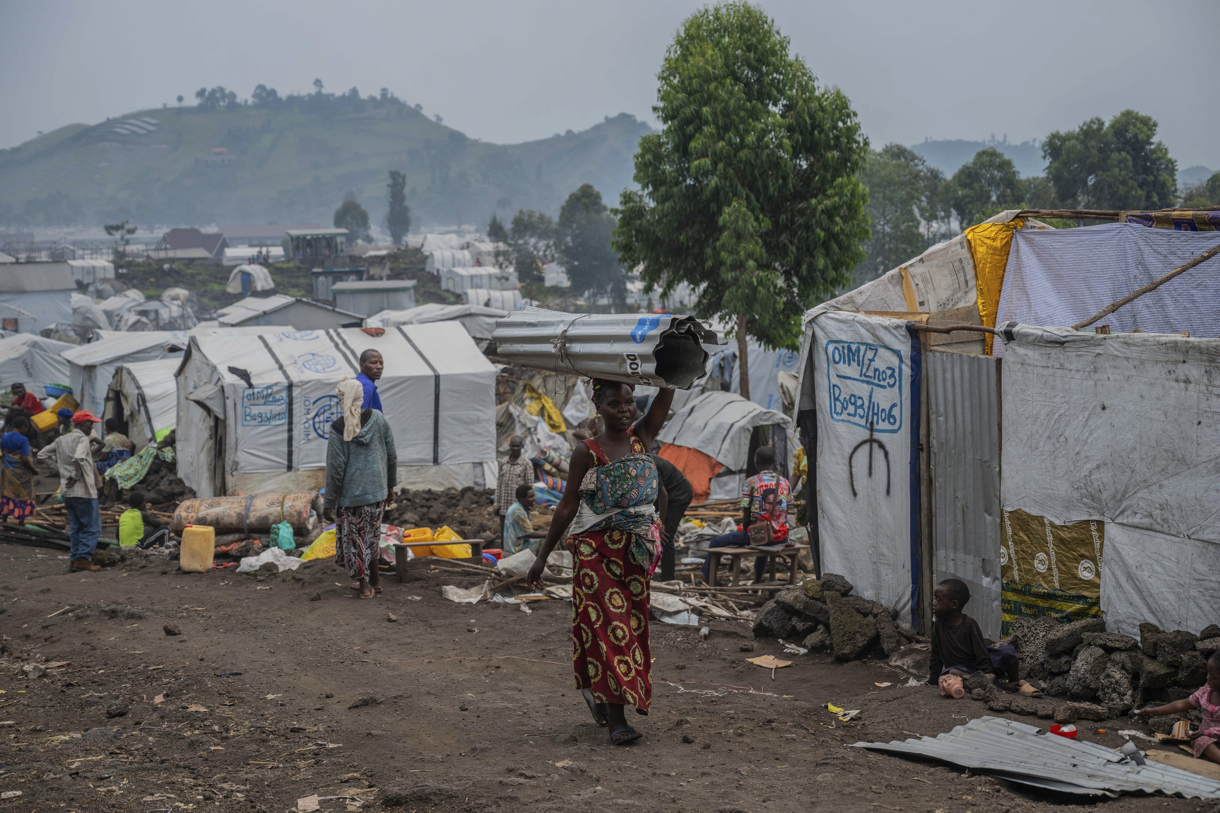 People displaced by the fighting between the M23 armed group and Congolese government forces leave their camp after the M23 ordered their displacement, Goma, Democratic Republic of Congo, February 11, 2025.