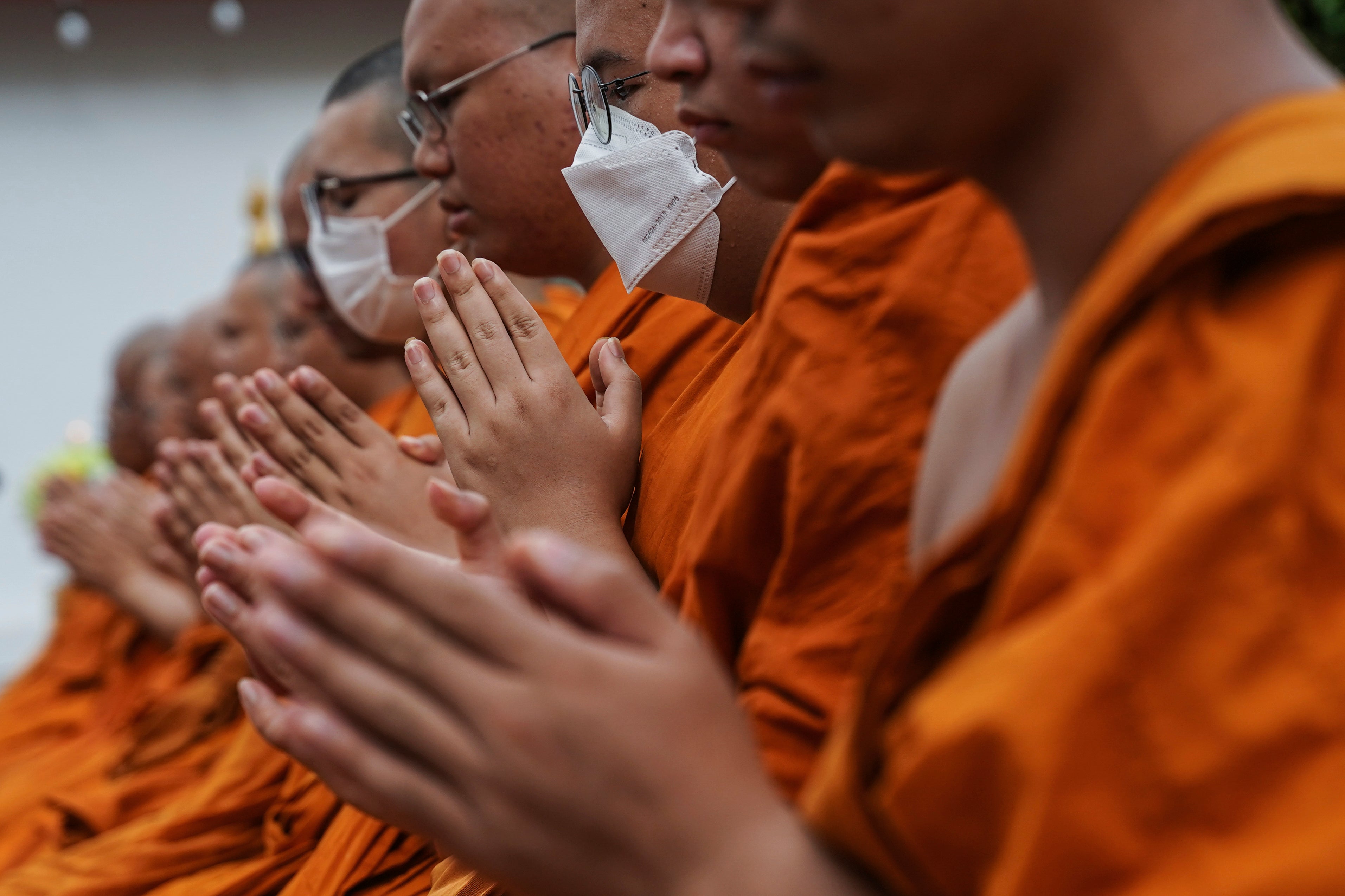 Buddhist monks mark the Songkran celebrations at Wat Pho temple in Bangkok, Thailand, April 13, 2025. 