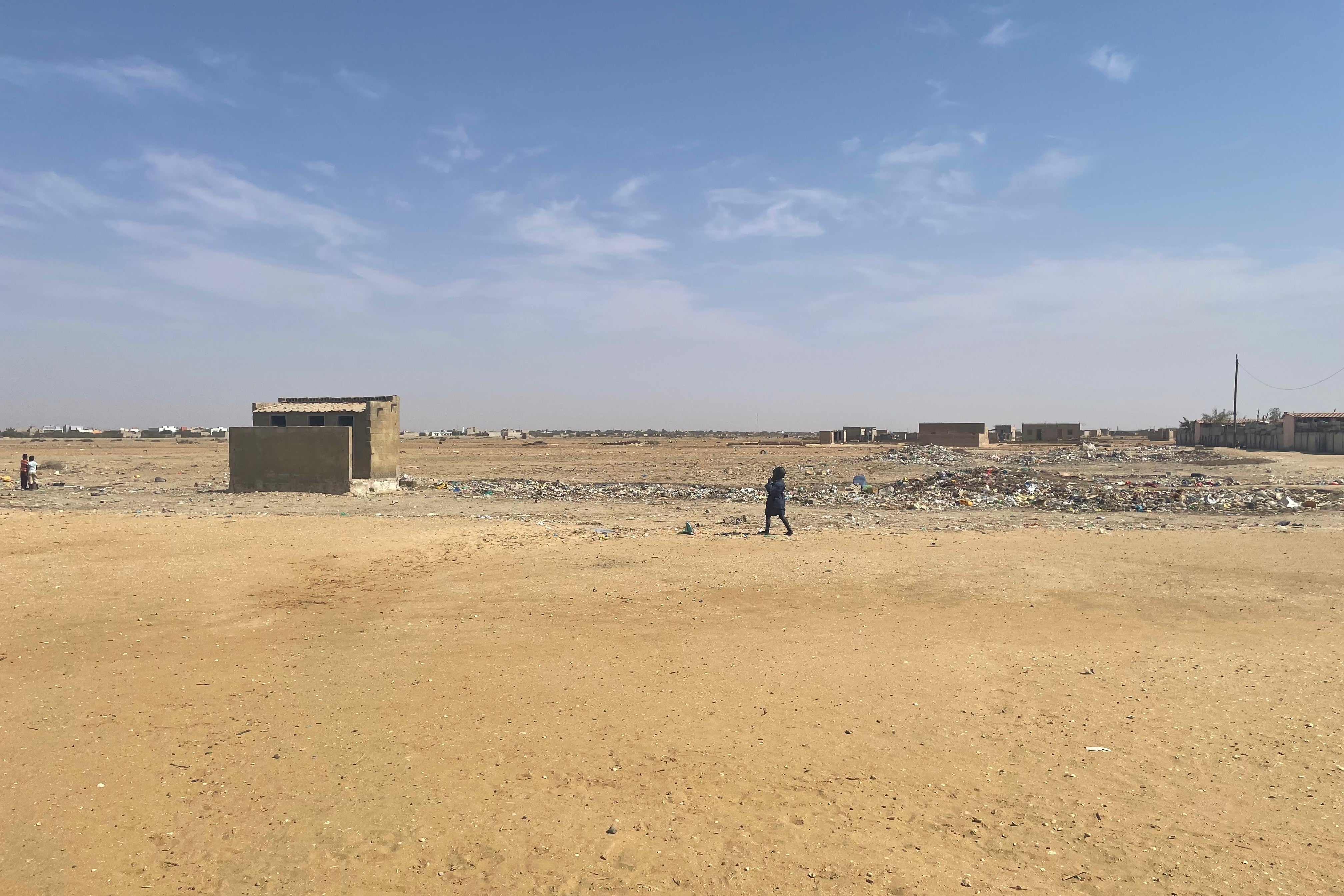 Space next to houses in Khar Yalla where people dump their household waste