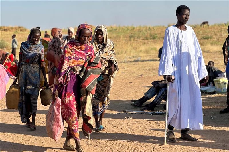 Displaced Sudanese people who fled El-Fasher after the city fell to the Rapid Support Forces (RSF) arrive in the town of Tawila, North Darfur, Sudan, on October 28, 2025.