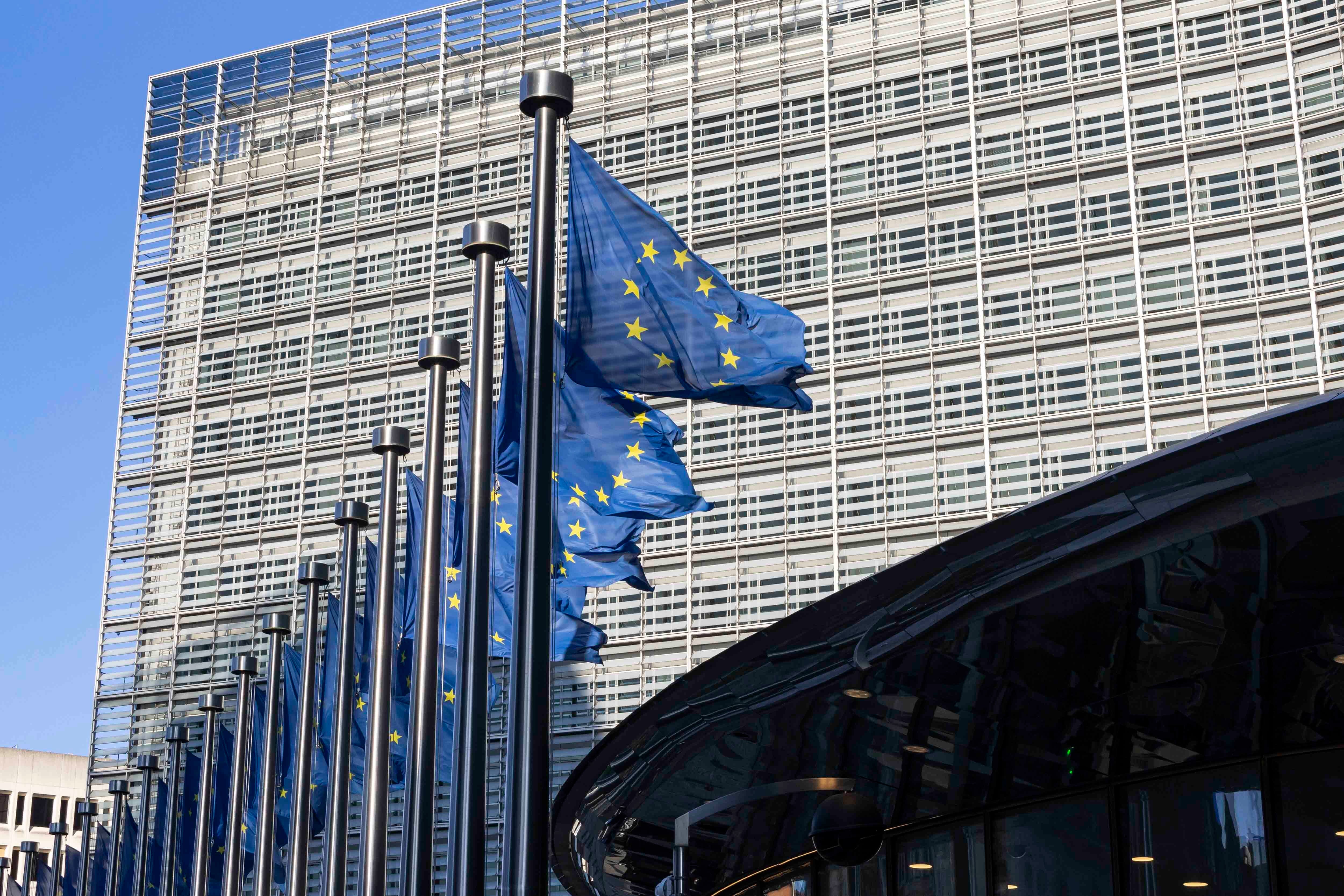 Flags of the Europe waving in front of the Le Berlaymont building, headquarters of the European Commission, in Brussels, Belgium in April 2024.