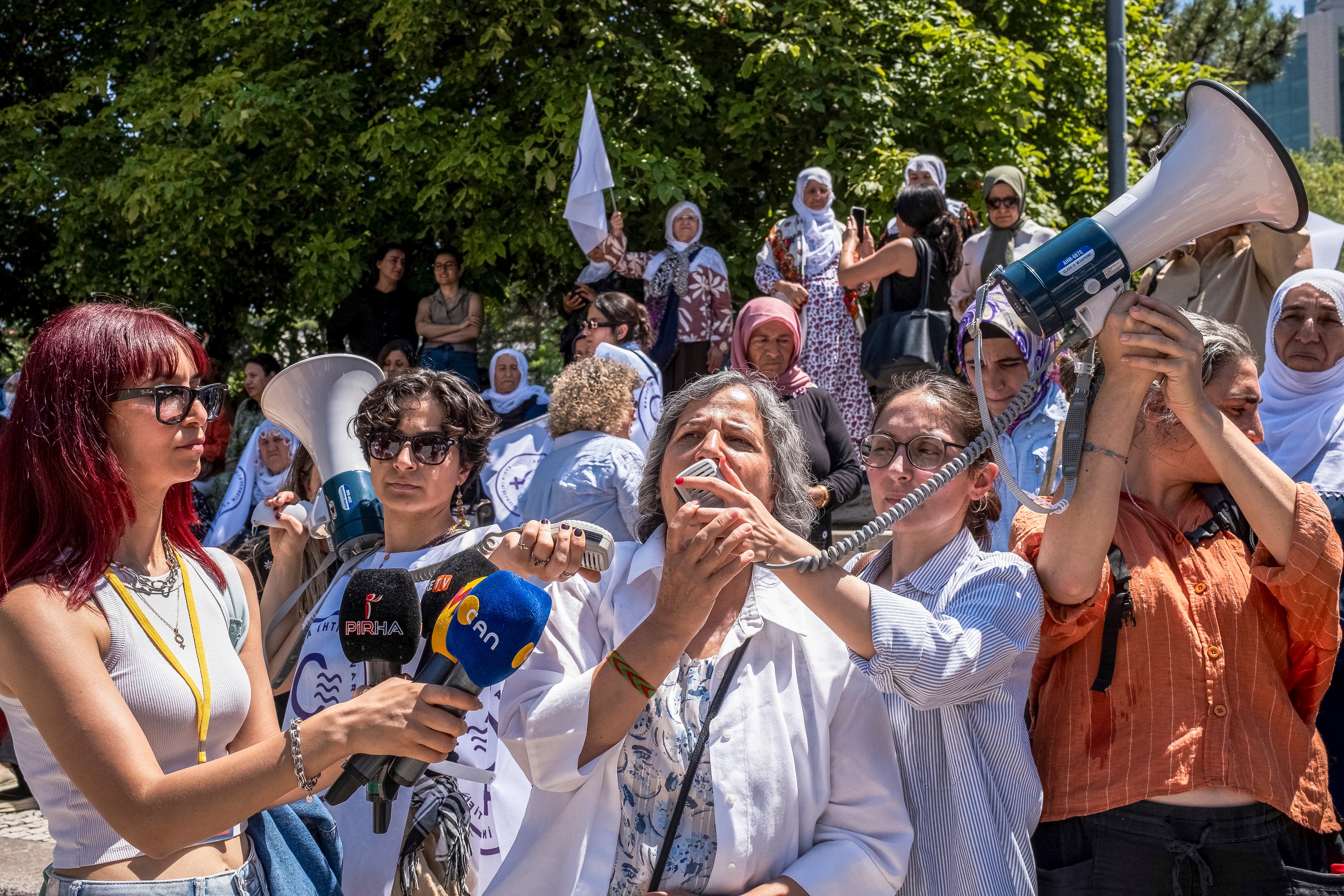 People march in front of the Turkish Grand National Assembly in Ankara during a demonstration organized by the "I Need Peace Women's Initiative”, July 8, 2025. 