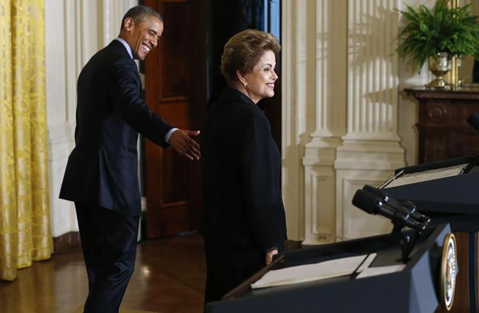 U.S. President Barack Obama and Brazil President Dilma Rousseff depart a joint news conference in the East Room of the White House in Washington, DC on June 30, 2015.