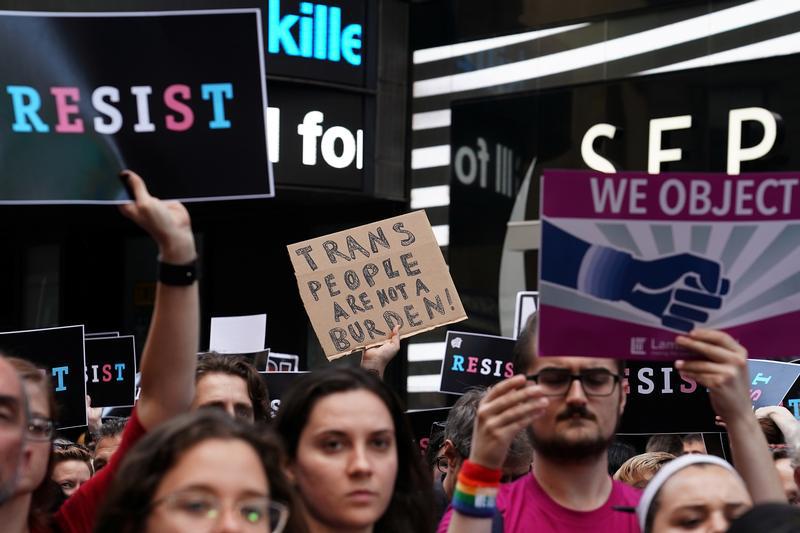 People protest U.S. President Donald Trump's announcement that he plans to reinstate a ban on transgender individuals from serving in any capacity in the U.S. military, in Times Square, in New York City, New York, U.S., July 26, 2017.