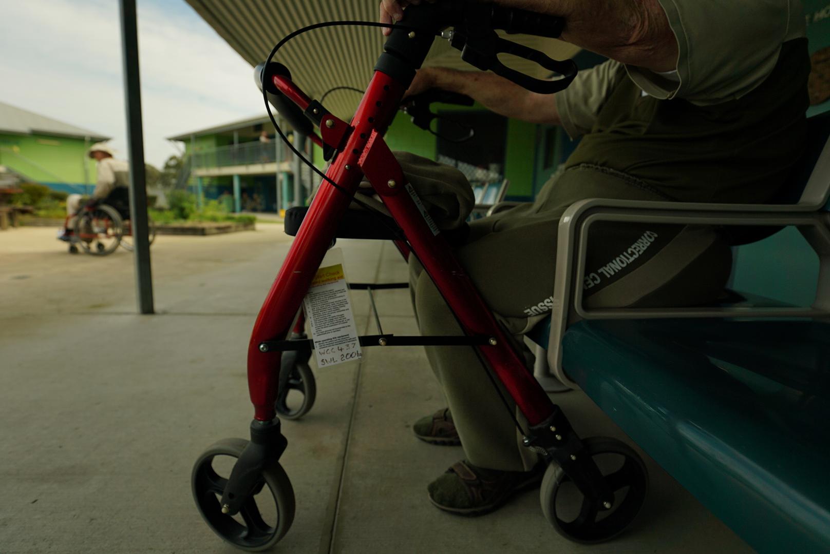 A prisoner with an assistive chair in Wolston Correctional Centre, Queensland. 