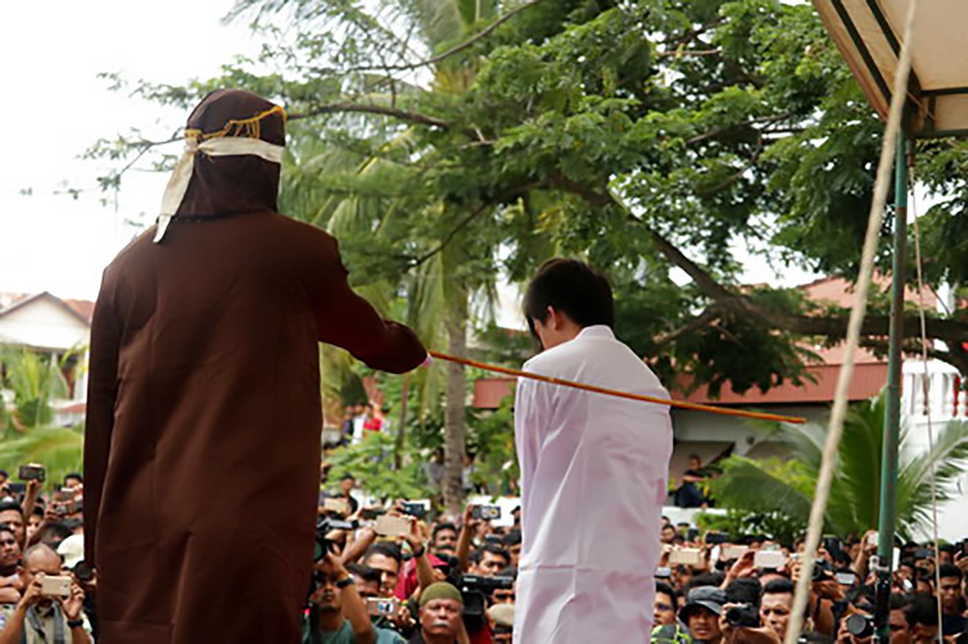 Two gay men were sentenced to 82 whips by the Shariah Court in Banda Aceh, Indonesia on May 23, 2017. In March 2018, four other people arrested in Aceh for same-sex conduct. 