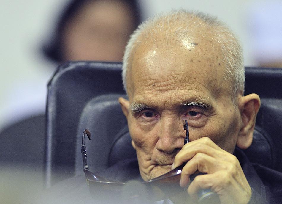 Nuon Chea sits in a court room before a hearing at the U.N.-backed war crimes tribunal in Phnom Penh, Cambodia