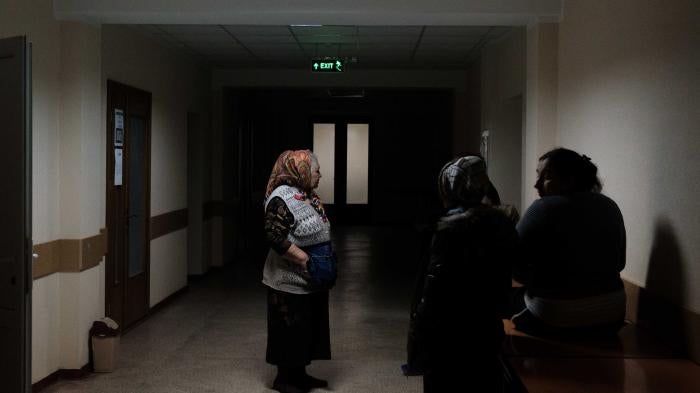 Refugees standing in the hallway of FRISPA center where most Romani refugees from Ukraine are accommodated, April 9, 2022. 