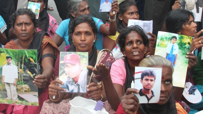Relatives of people who disappeared during or after the civil war protest in Jaffna, Sri Lanka, November 15, 2013.