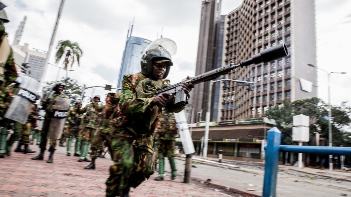 Riot police patrol during a protest on June 25, 2025, in Nairobi, Kenya. Today's demonstration marks the first anniversary of the 2024 anti- Finance Bill protests.