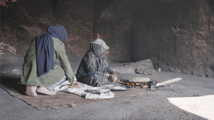 Bedul women making bread in one of the caves in Stooh al-Nabi Harun Mountain, Jordan.