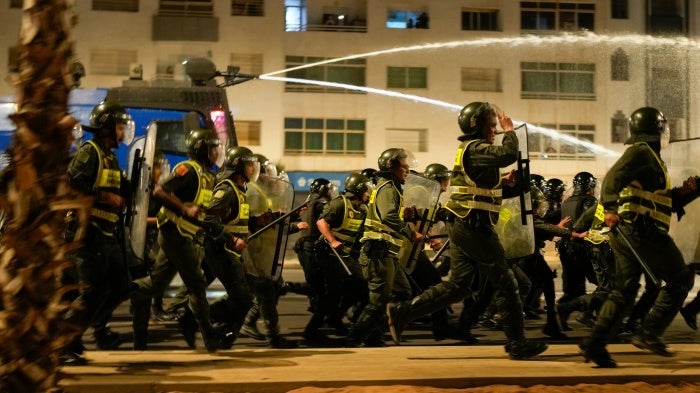 Security forces use water cannons to disperse youth protesters calling for healthcare and education reforms, in Salé, Morocco, October 1, 2025.