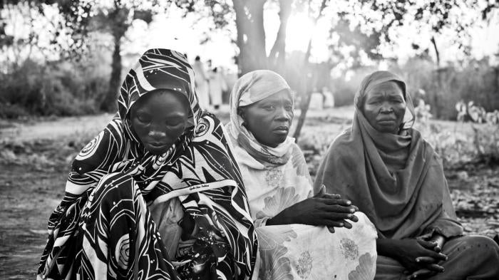 In late 2011, Fatima Al Ghomous, Zainab Atoum and Amna Adam al-Dhaib fled the government bombardments—as many as three attacks a day— near their homes in Surkum.