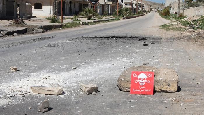 A poison hazard danger sign is seen in the town of Khan Sheikhoun, Idlib province, Syria on April 5, 2017. © 2017 Abdussamed Dagul/Anadolu Agency/Getty Images