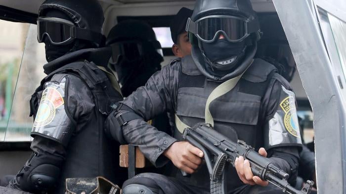 Members of security forces keep watch in Tahrir Square during the fifth anniversary of the uprising that ended the 30-year reign of Hosni Mubarak in Cairo, Egypt, January 25, 2016.