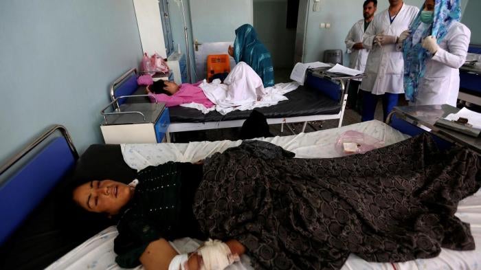 An Afghan woman receives medical treatment after being injured during an airstrike in Herat province, Afghanistan, August 29, 2017.
