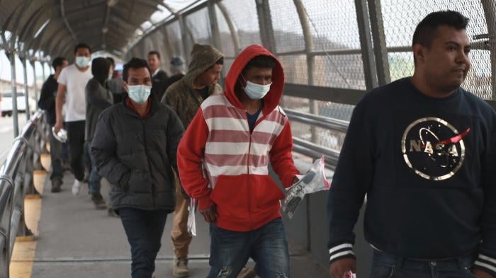 People walking with masks