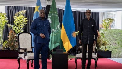 Democratic Republic of Congo President Felix Tshisekedi (L) and Rwandan President Paul Kagame at the Serena Hotel in Rubavu, Rwanda, on June 25, 2021. 