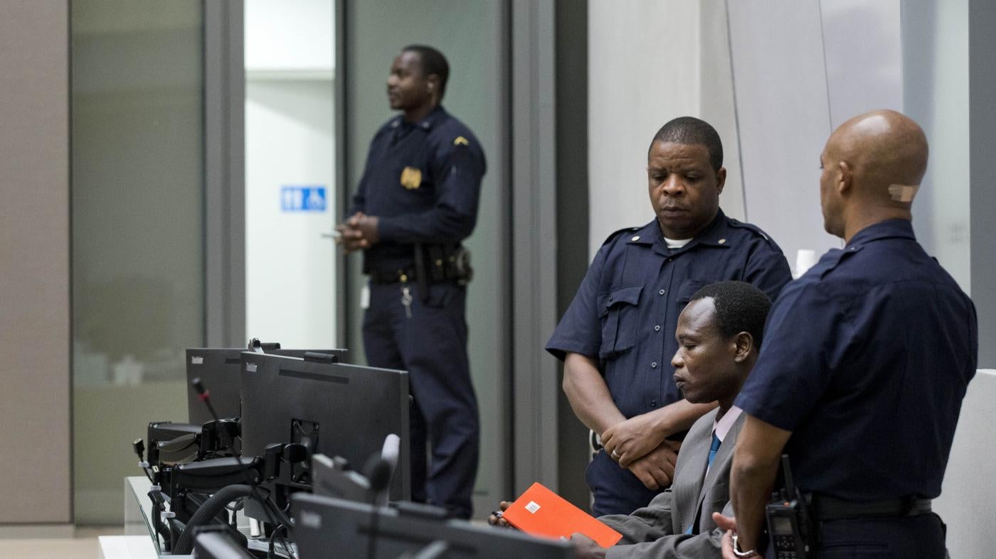 Dominic Ongwen, a senior commander in the Lord's Resistance Army, sits in the court room of the International Court in The Hague, Netherlands