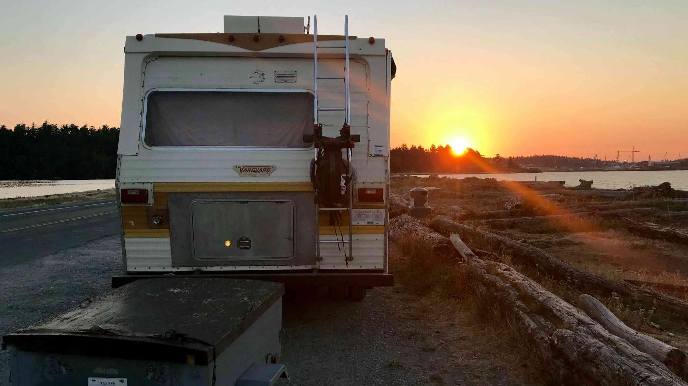 Camper van at sunset