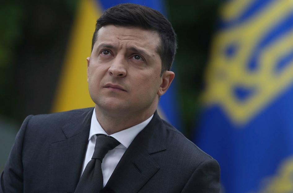 Ukraine President Volodymyr Zelensky looks on during a press conference in the garden of the Mariinsky Palace in Kyiv, May 22, 2020.