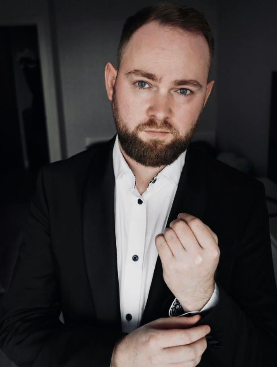 Ilya Bronsky wearing a jacket and shirt