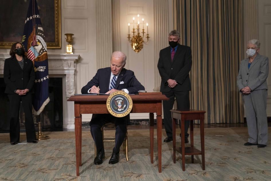 US President Joe Biden signs a series of executive orders on tackling climate change on January 27, 2021 in Washington, DC.