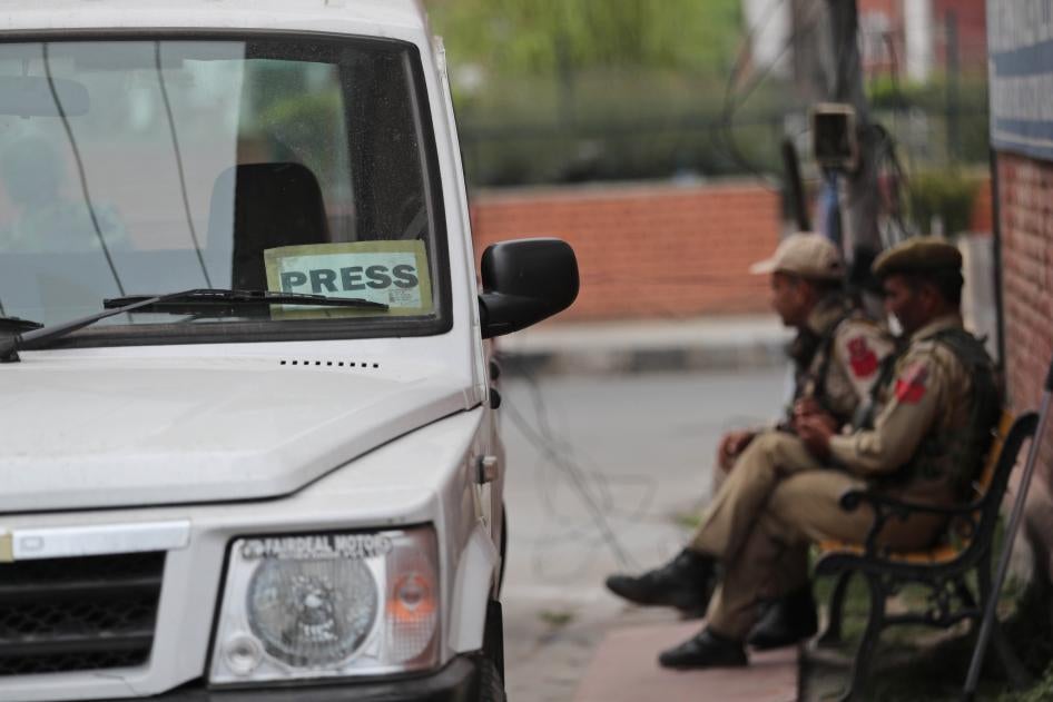 Policemen at the entrance of Press Enclave, which houses several newspaper offices, in Srinagar, India, September 8, 2021. 