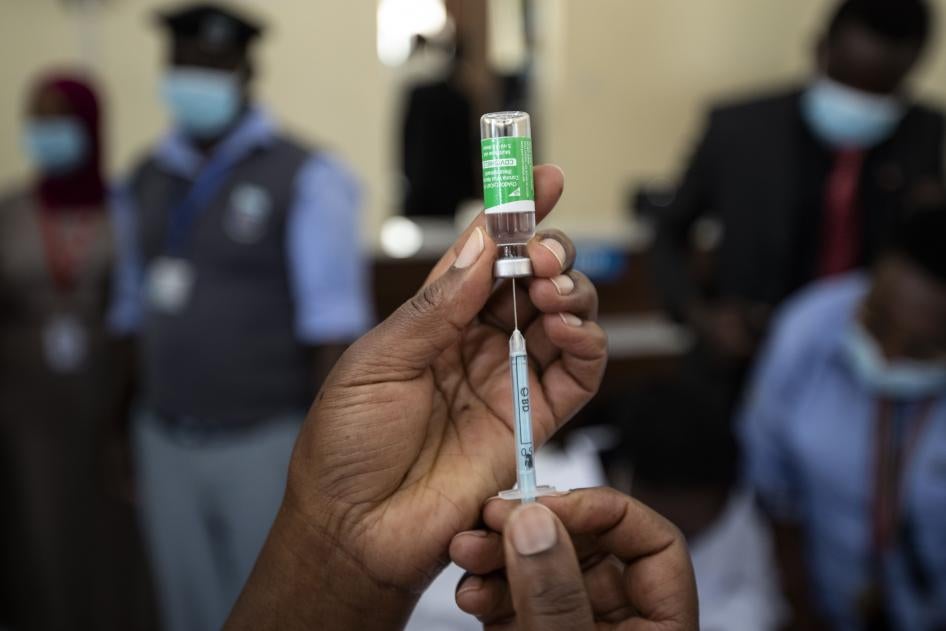 A nurse prepares a dose of the AstraZeneca Covid-19 vaccine at Kenyatta National Hospital in Nairobi, Kenya, March 5, 2021