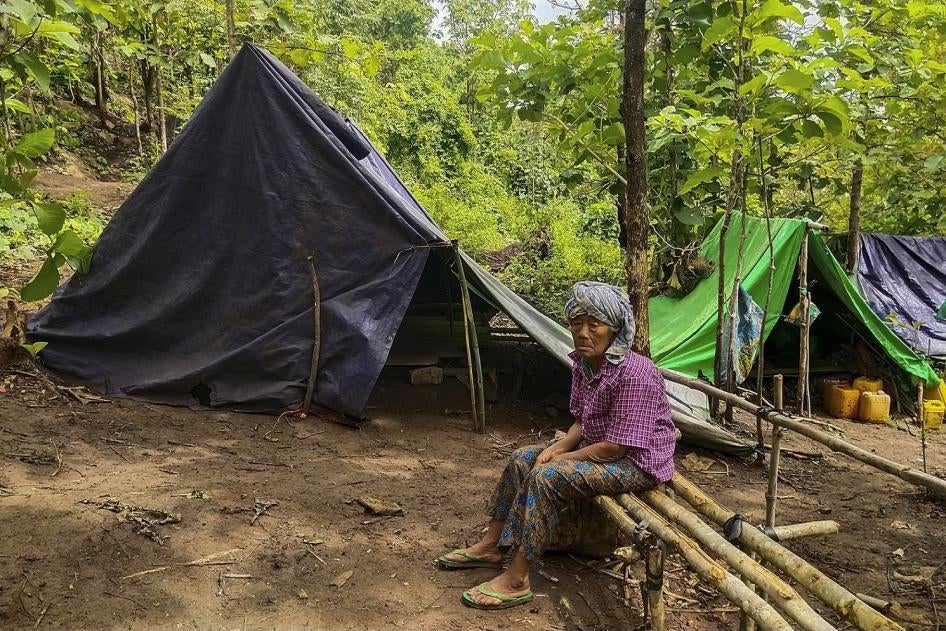 A man sits at a makeshift displacement site in Demoso township, Karenni State, June 17, 2021.