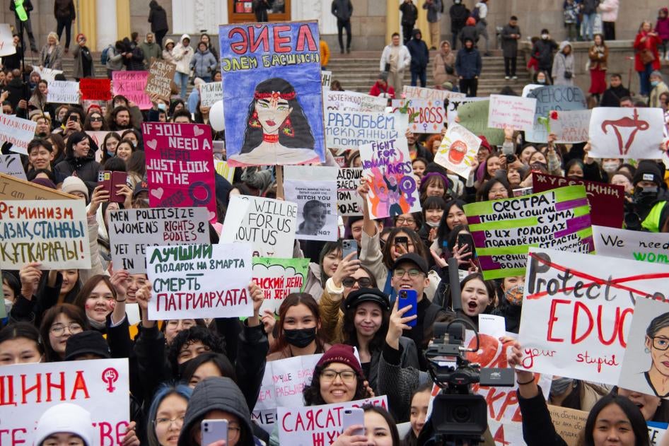 Participants of the rally holding signs