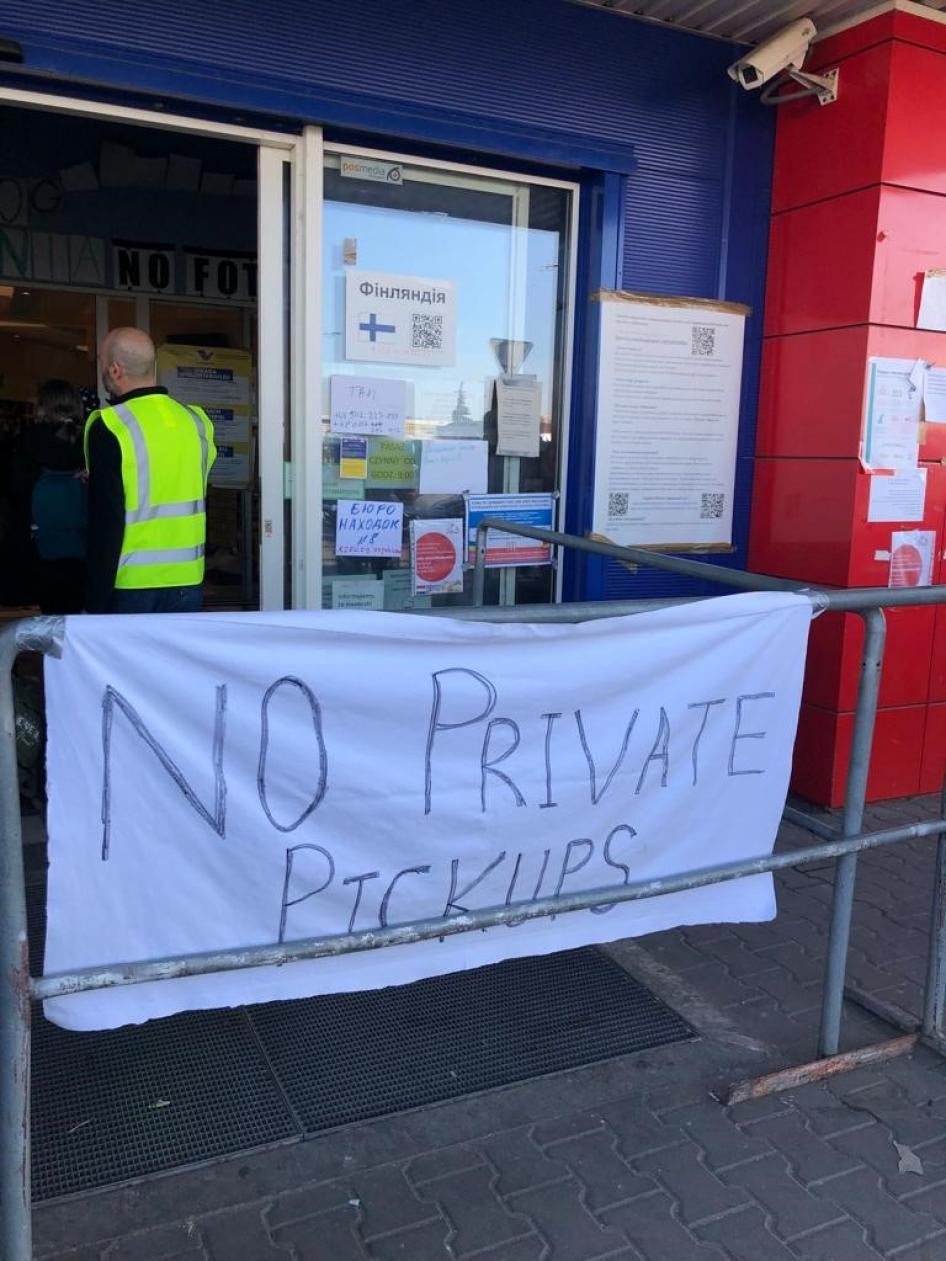 A sign outside the Tesco refugee reception center in Przemyśl, Poland, where the coordinator said they had prohibited offers of private transport for refugees two days prior, March 23, 2022.