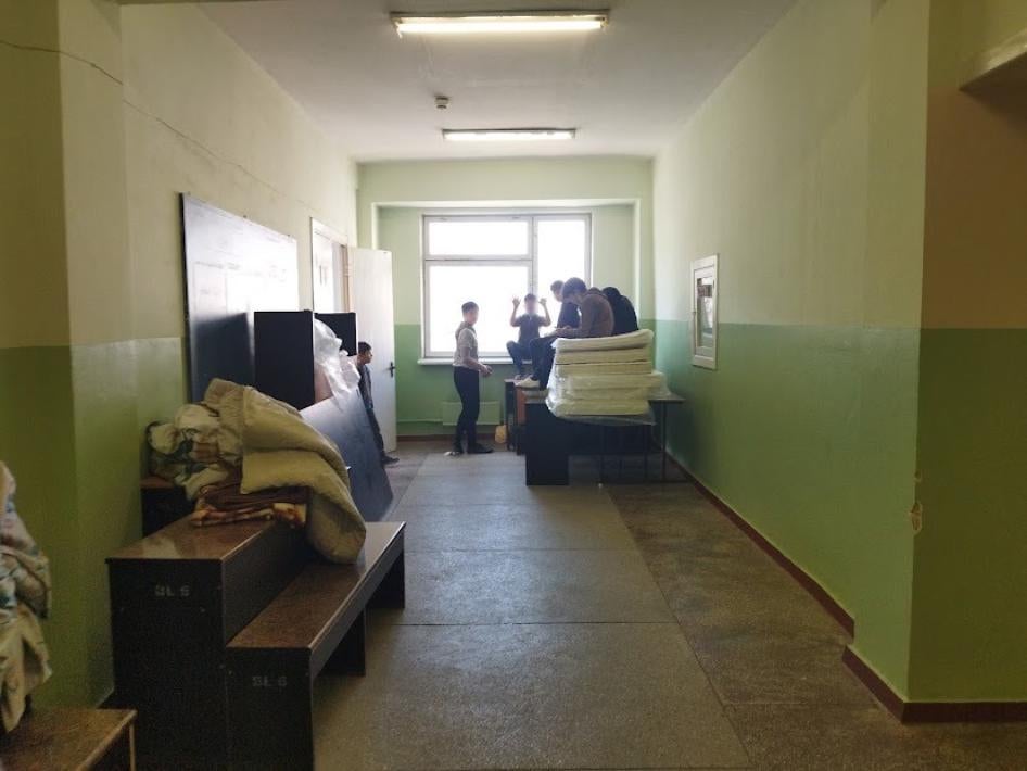 Children wave in the corridor of FRISPA, Chisinau, Moldova, end of March 2022.