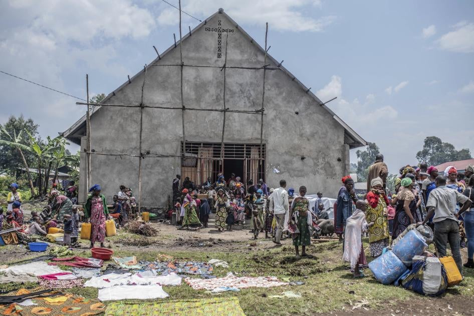 Civilians flee fighting between M23 rebels near Kivu.