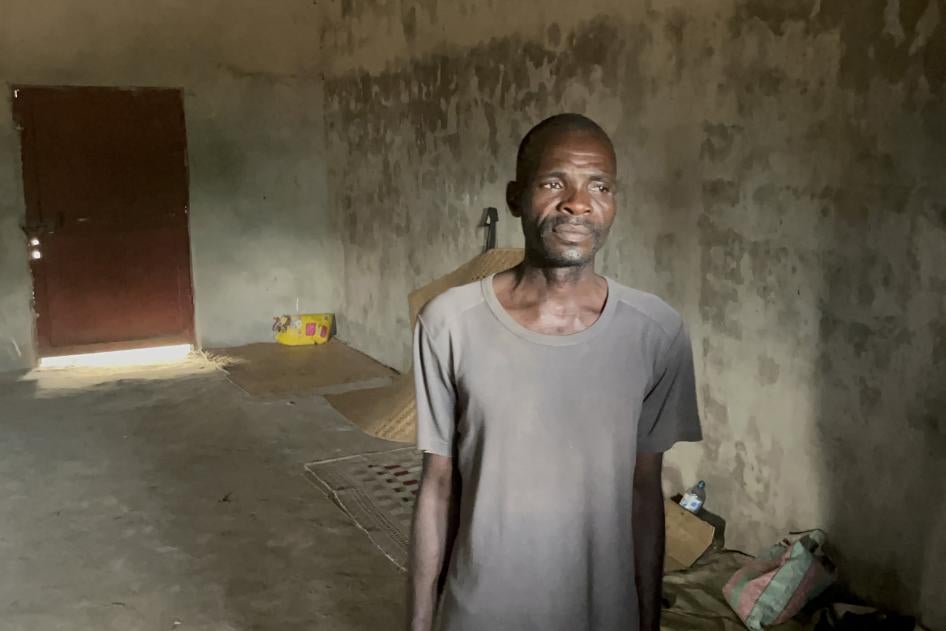 Portrait of a man in an empty room 