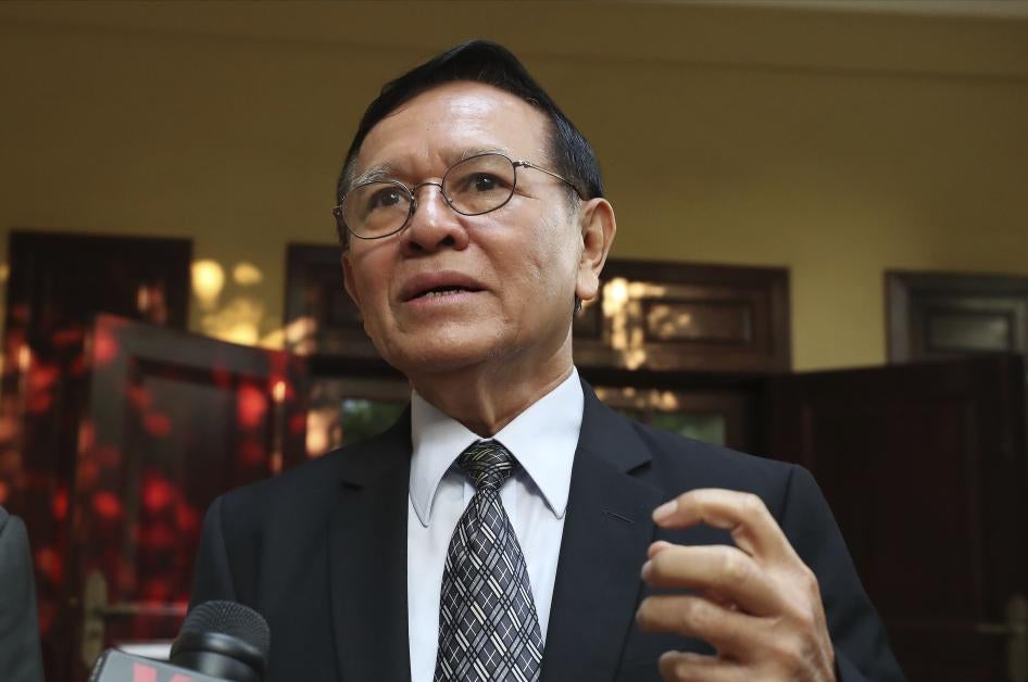 Cambodia’s opposition leader Kem Sokha talks to the media at his home before leaving for a court hearing in Phnom Penh.